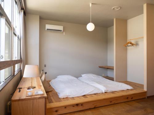 Кровать или кровати в номере NOTEL Stay in a farming village