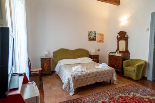 Ένα ή περισσότερα κρεβάτια σε δωμάτιο στο b&b Vallone del grano