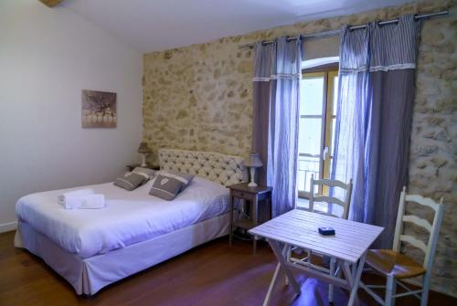 Katil atau katil-katil dalam bilik di Le Relais De Pigasse