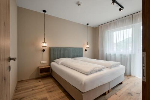 Una cama o camas en una habitación de Art Residence Josefshof