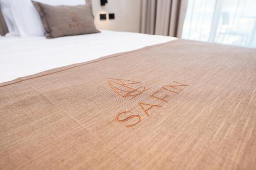 Postel nebo postele na pokoji v ubytování Safin Hotel & Spa