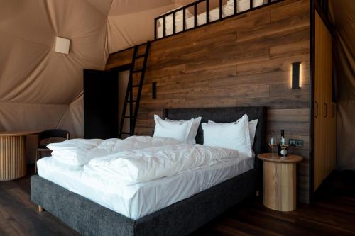 a bedroom with a bed in a tent at Chalet Fomich in Bukovel