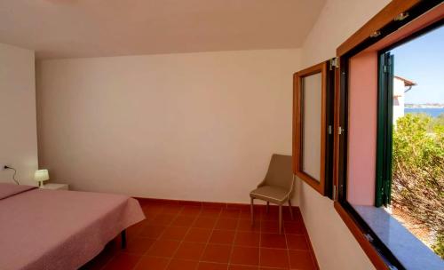 Postel nebo postele na pokoji v ubytování Residenza Aukelos