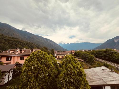 a view of a village with mountains in the background at Villa Chiara in Gravellona Toce