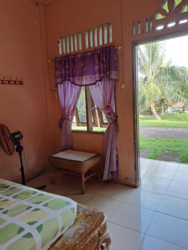 Postel nebo postele na pokoji v ubytování Wild Gibbon Guesthouse