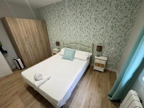 A bed or beds in a room at Pisazo en Pleno centro!!