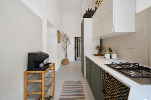 Una cocina o cocineta en Casetta Limone Loft