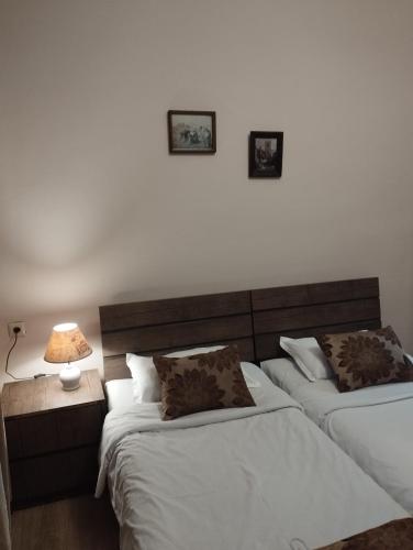 Postel nebo postele na pokoji v ubytování Anastasia studio