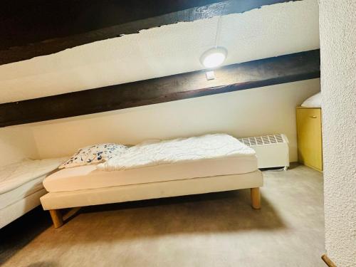 Postel nebo postele na pokoji v ubytování Le cosy vue mer