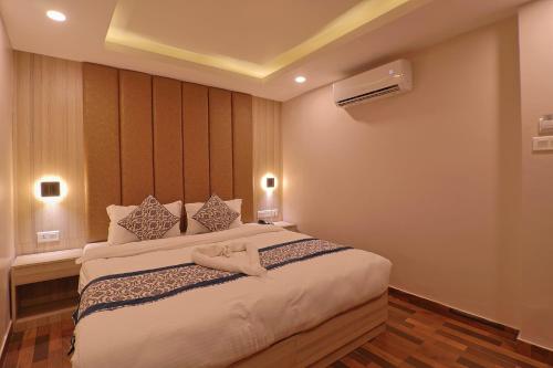 a bedroom with a large bed in a room at Hotel Annapurna Palace in Kathmandu