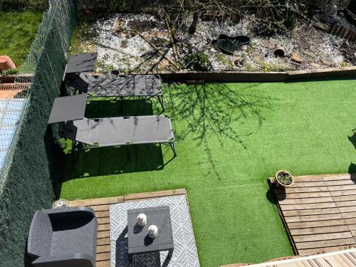 an overhead view of a lawn with a table and chairs at Casa Tau in Larrasoaña