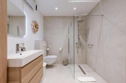 a bathroom with a shower and a sink and a toilet at Huswell - Lovely retreat for 2 in Antwerp in Antwerp