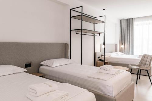 Postel nebo postele na pokoji v ubytování Central Park Premium Hotel