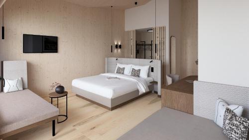 Postel nebo postele na pokoji v ubytování Hotel Neubergerhof