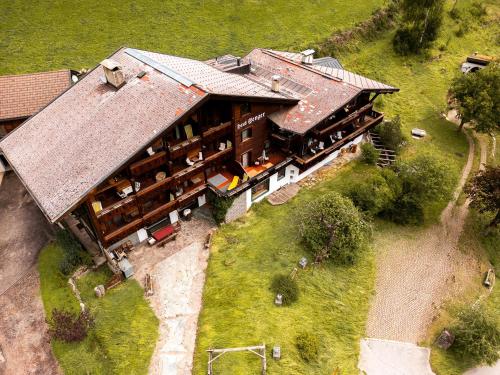 an overhead view of a house with a building at Aparthotel Heiligenblut in Heiligenblut