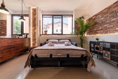 Ένα ή περισσότερα κρεβάτια σε δωμάτιο στο Wild Loft 20' Milan, 15 RHO-FIERA & MXP