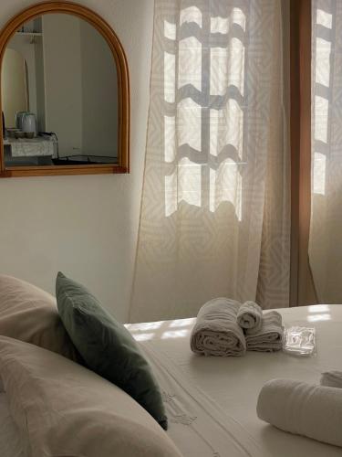 Ένα ή περισσότερα κρεβάτια σε δωμάτιο στο Gió guest house