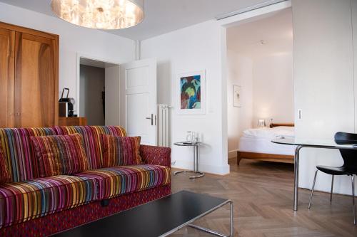 Ein Bett oder Betten in einem Zimmer der Unterkunft Hotel Saratz Pontresina Mountain Resort & Spa