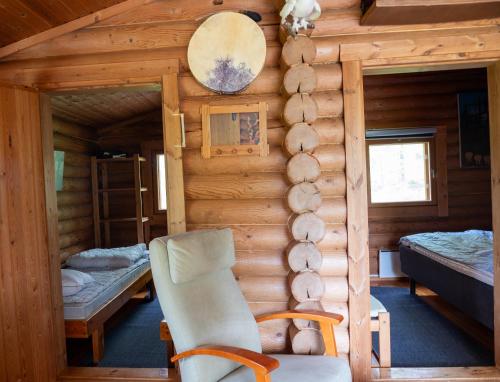 Postel nebo postele na pokoji v ubytování Tunturilapin Tuvat