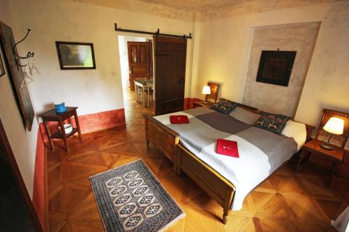 Postel nebo postele na pokoji v ubytování Apartmány zámek Třebešice