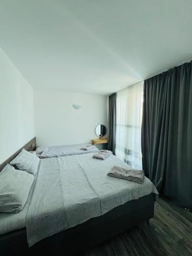 Postel nebo postele na pokoji v ubytování Green Paradise apartments