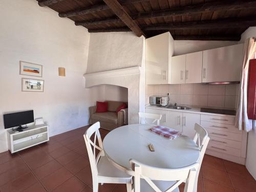 Køkken eller tekøkken på Casa Oliveira - Casas da Amieira