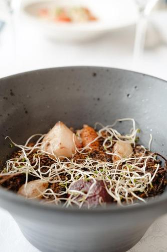 a bowl of food with noodles and meat at Pousadela Village & Spa in Vieira do Minho