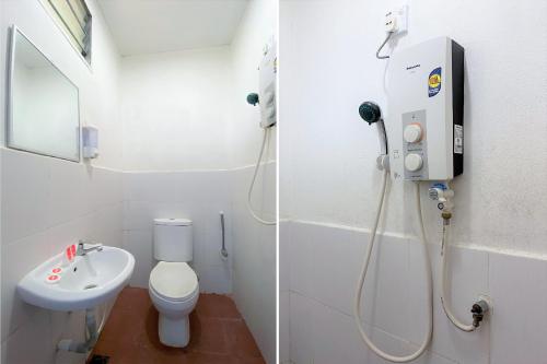 a small bathroom with a toilet and a sink at Capital O 90168 Serambi Pelangi Chalet in Changlun
