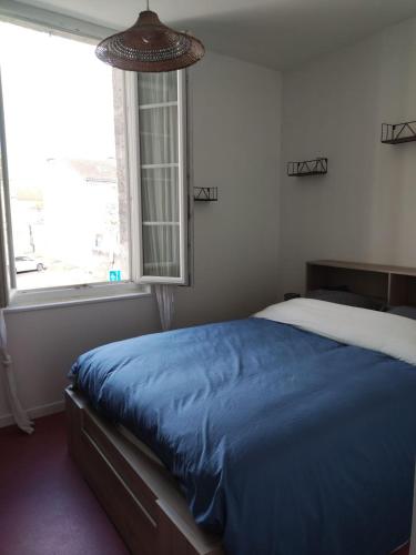 Postel nebo postele na pokoji v ubytování Terrasse plein ciel, 10 minutes gares et centre-ville, parking