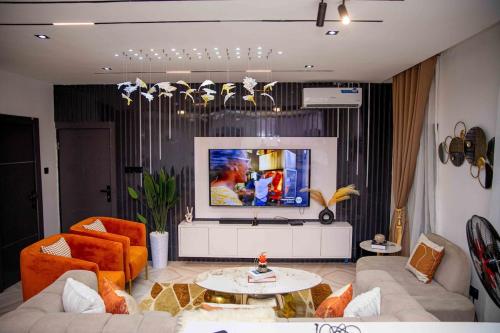 Μια τηλεόραση ή/και κέντρο ψυχαγωγίας στο WhitneyW Luxury Apartments