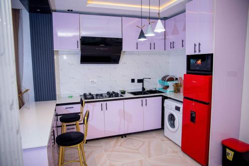 Η κουζίνα ή μικρή κουζίνα στο WhitneyW Luxury Apartments