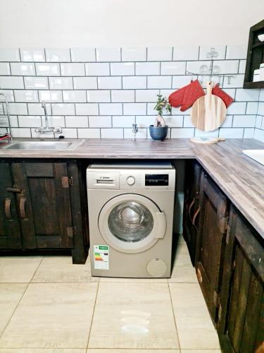 Η κουζίνα ή μικρή κουζίνα στο B&B Accommodation 109 Bezuidenhout