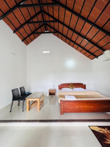 Postel nebo postele na pokoji v ubytování Greenhouse Homestay