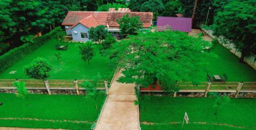 an aerial view of a house with a tree at 4Luxury Hotel in Moshi