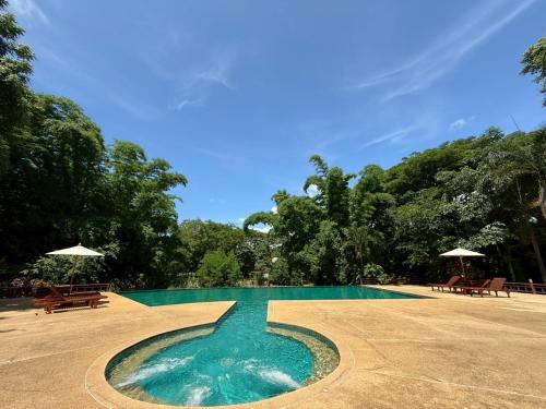 Bazén v ubytování Baan Krating Pai Resort - SHA Plus nebo v jeho okolí