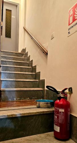 a fire hydrant sitting in front of some stairs at Da Zia Teresa 