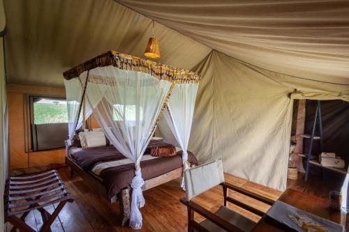 Postel nebo postele na pokoji v ubytování Mawe Tented Camp