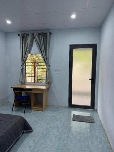 Postel nebo postele na pokoji v ubytování Nhà nghỉ Thu Bông - Thu Bong motel