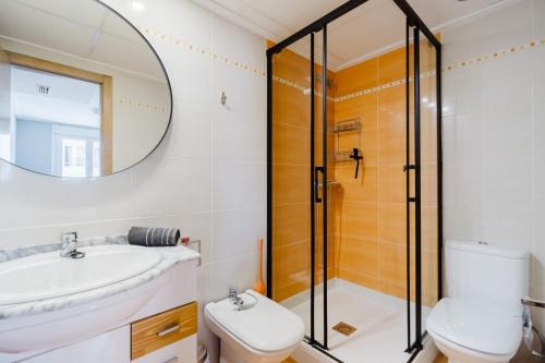 a bathroom with a sink and a shower at Chillout Grau de Gandia- attico para 6 personas dos banos VT-44956-V in Gandía