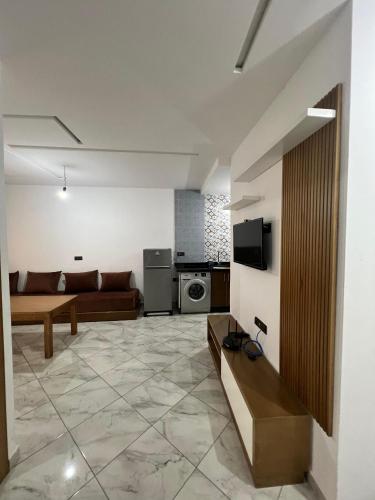 Kuchyň nebo kuchyňský kout v ubytování Appartements familiaux confortables à 5 min de la plage Martil شقق عائلية مريحة على بعد 5 دقائق من الشاطئ مرتيل