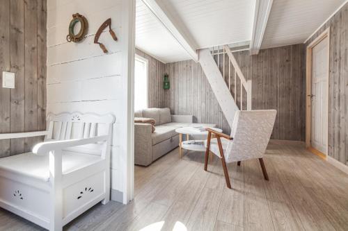 Ένα ή περισσότερα κρεβάτια σε δωμάτιο στο Tind seaside cabins