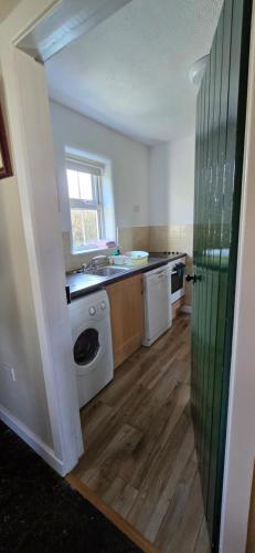 Kuchyň nebo kuchyňský kout v ubytování Daffodil Cottage 2 Bedroom