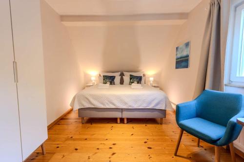 Ένα ή περισσότερα κρεβάτια σε δωμάτιο στο Villa Muehlenschenke