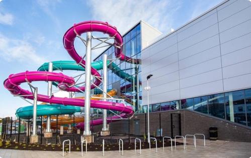 a water slide in front of a building at Saffron Loft, Belfast in Belfast