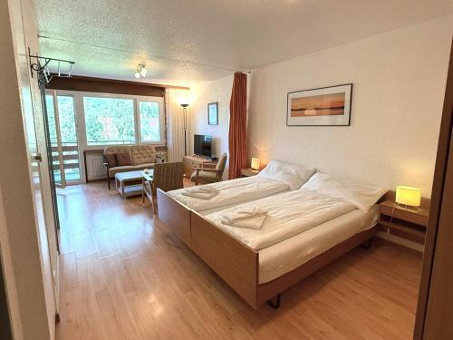 Ένα ή περισσότερα κρεβάτια σε δωμάτιο στο Royal 33