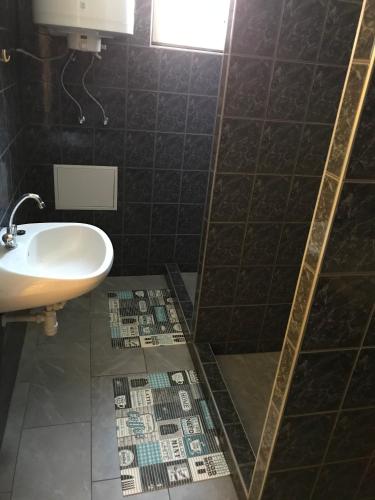 Bilik mandi di Martin Vendégház