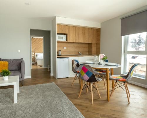 Апартамент с люлка и гледка в The House с Термална зона