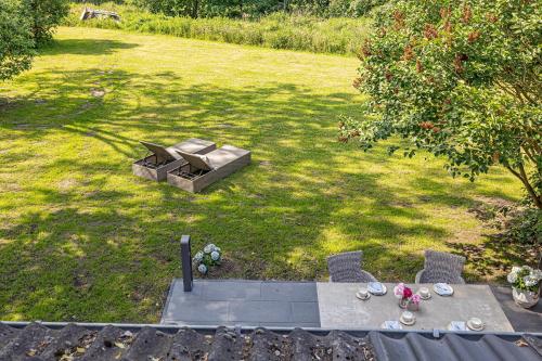 an overhead view of a table and chairs in a yard at Gut Oehe in Maasholm