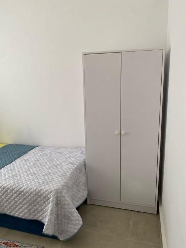 Ένα ή περισσότερα κρεβάτια σε δωμάτιο στο Mountain View Apartments