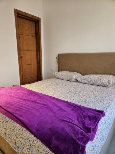 Ένα ή περισσότερα κρεβάτια σε δωμάτιο στο Mountain View Apartments